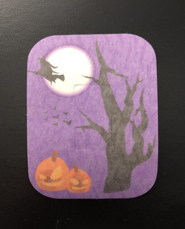 Halloween Flying Witch Designed precut adhesive patch to secure all diabetic devices